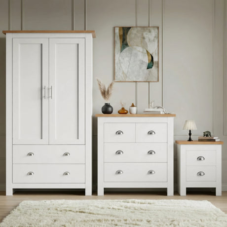 [White] Shaker white wardrobe, 4 drawer chest and 2 drawer bedside grouped on shaggy rug with oak tops