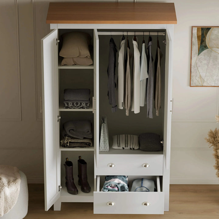 [White] White Shaker wardrobe open showing left shelves and right hanging rail part of bedroom furniture set