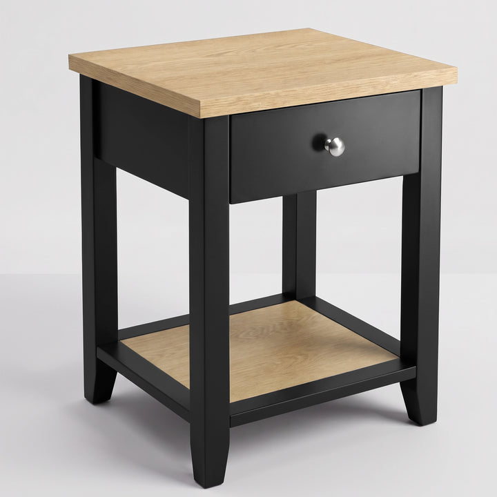 [Black] Angled high view showing the bedside table with oak-effect top, drawer, open shelf and metal knob