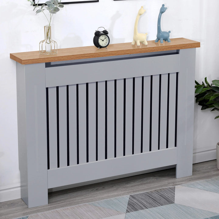 [Medium | Grey] Medium grey radiator cover with oak top and vertical slats, styled with toys and clock, perfect for children's rooms or living areas.