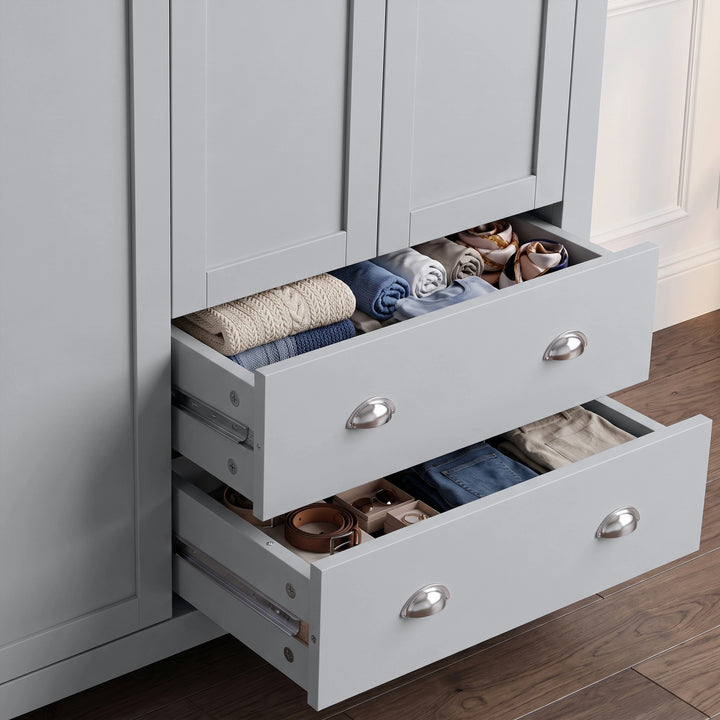 [Grey] Close-up of open bottom drawers with cup handles showing interior storage space in grey wardrobe.