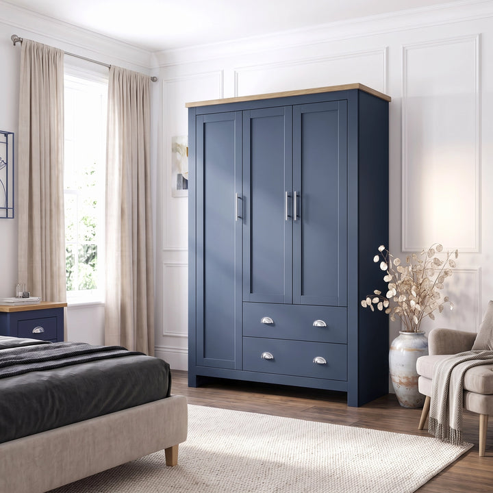 [Blue] Shaker Triple Wardrobe With Drawers And Shelves closed showing three doors and a natural oak wood top.