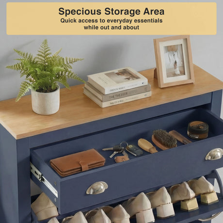 [Blue] Top drawer of blue shoe cabinet pulled out holding wallet, scissors, shoe brushes and small jar