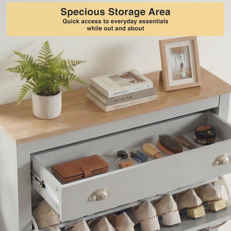 [Grey] Close-up of grey 2 door shoe cabinet drawer area with leather wallet and shoe-care tools laid inside