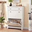 [White] Slim hallway shoe cabinet in white with bottom flip-down door open exposing two rows of shoes on angled racks