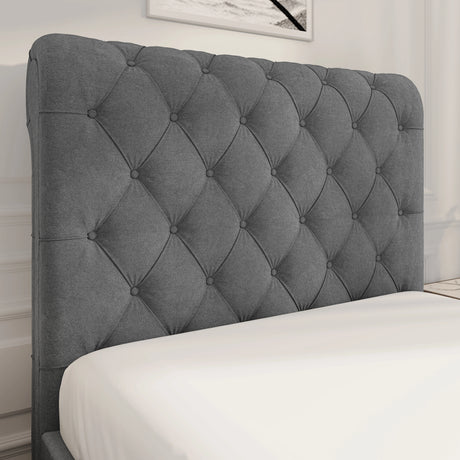 Chesterfield Ottoman Storage Bed with side lift in dark grey fabric, featuring a deep button-tufted headboard for a classic, elegant bedroom look.
