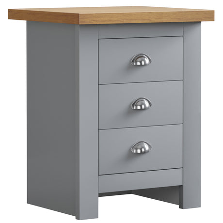 Side table with drawer and handles, perfect for stylish and practical bedroom storage.