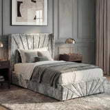 [Single | Silver] Silver crushed velvet ottoman bed dressed with grey throw, abstract beige art on panelled wall behind