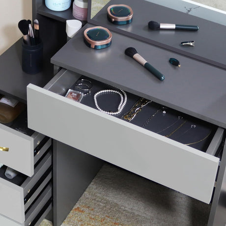 Silver-grey dressing table with mirror for a sleek and elegant vanity setup.