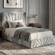 [Single | Silver] Angled room view of Sunrise bed with panelled wall, framed art, and herringbone floor