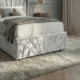 [Single | Silver] Footboard detail on Sunrise bed showing pleated velvet panels and metal support feet