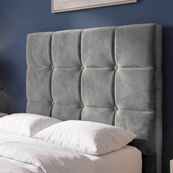 [Single | Grey] Close-up of square panel headboard with button detail, soft upholstery, white pillows, and blue wall