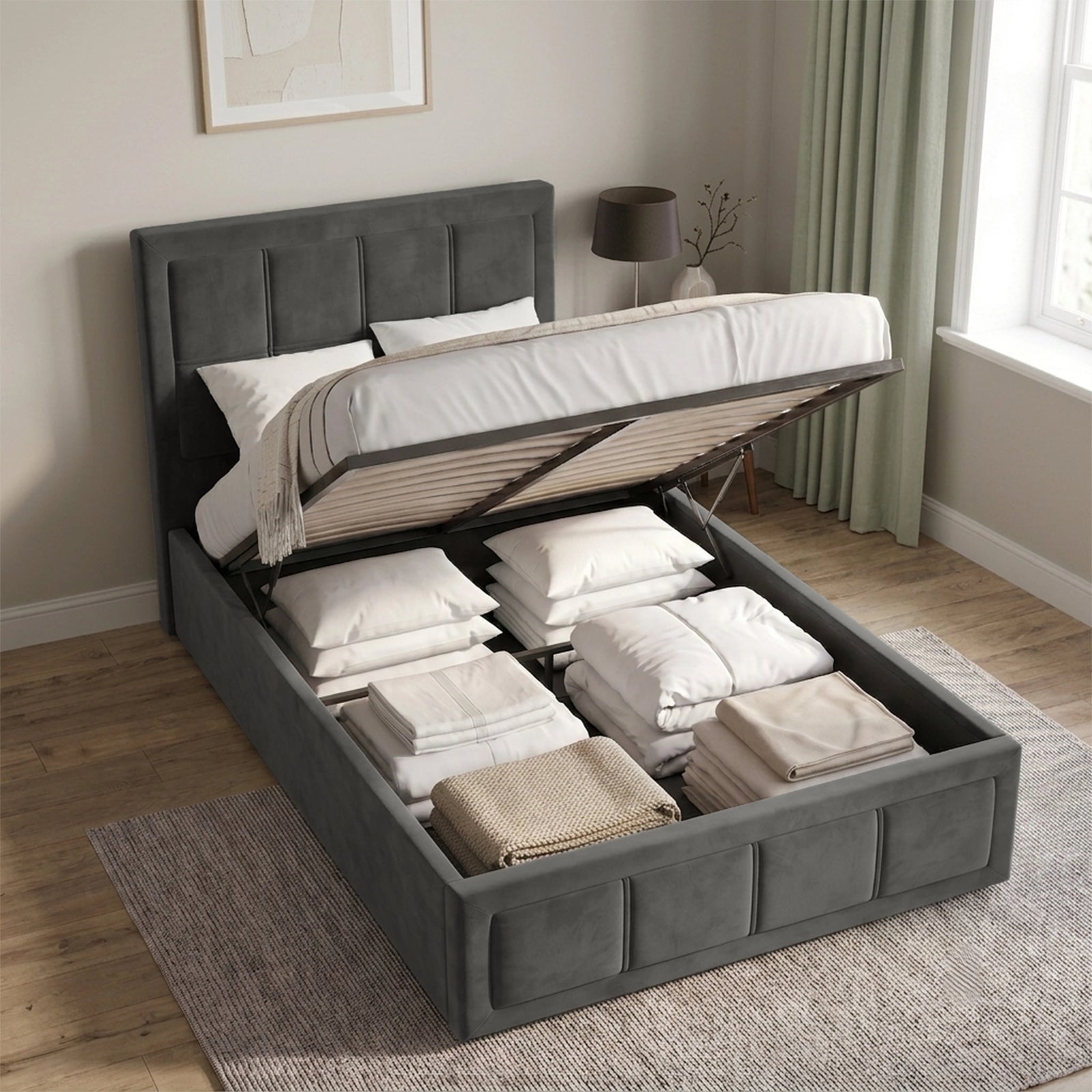 [Single | Grey] Velvet end lift ottoman bed open, exposing under-bed storage filled with pillows, sheets and throws