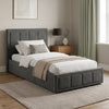 [Single | Grey] Velvet ottoman storage bed angled view with channel-panel headboard and decorative base squares