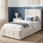 [Single | Beige] velvet upholstered bed frame with a tall tufted headboard and matching footboard, shown in a styled bedroom with white bedding