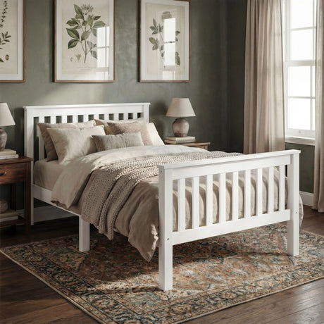 White single wooden bed frame with a slatted design, soft bedding, and decorative pillows in a cozy bedroom setting