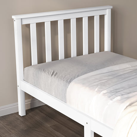 Single wooden white bed, perfect for a minimalist and elegant bedroom setting.