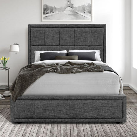 Single dark grey upholstered bed with tufted headboard and cozy bedding in a modern bedroom.