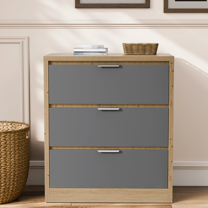 [Oak+Grey] Three drawer Skova chest with oak surround and grey fronts, silver bar handles aligned across each drawer