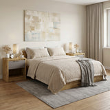 [Oak+Grey] Two Skova bedside tables placed beside a low cream bed on a jute rug, grey drawer fronts visible