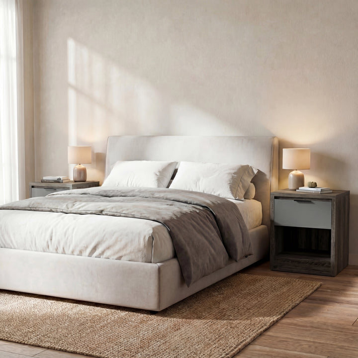 [Wooden Grey+Grey] Skova bedside pair flanking a cream upholstered bed, dark wooden grey tops with lit lamps