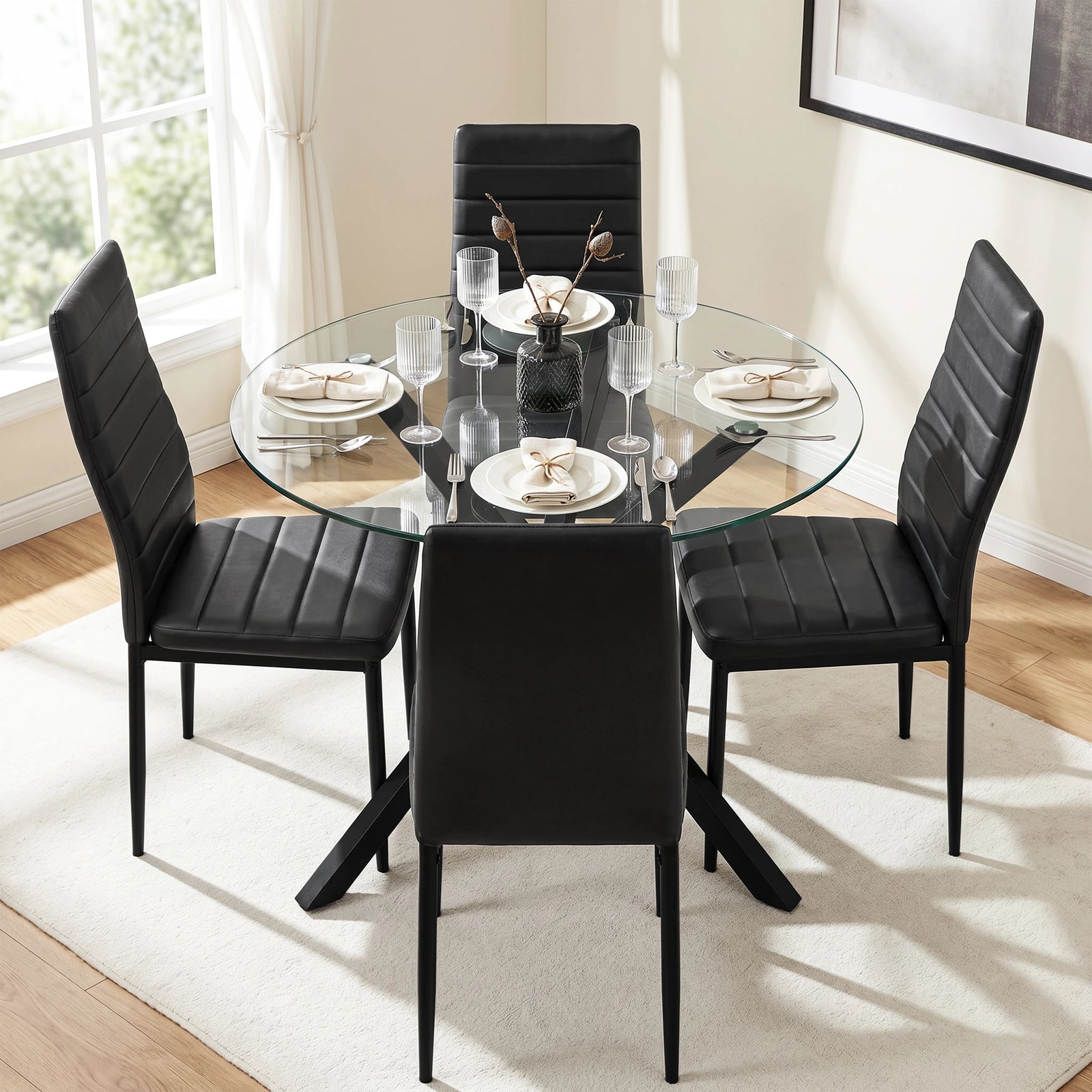 [Black] Skyra dining table set viewed from above with four chairs and place settings
