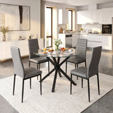 [Grey] Skyra Round Glass Dining Table and 4 Grey Chairs Set styled in a bright modern open-plan kitchen and dining area.