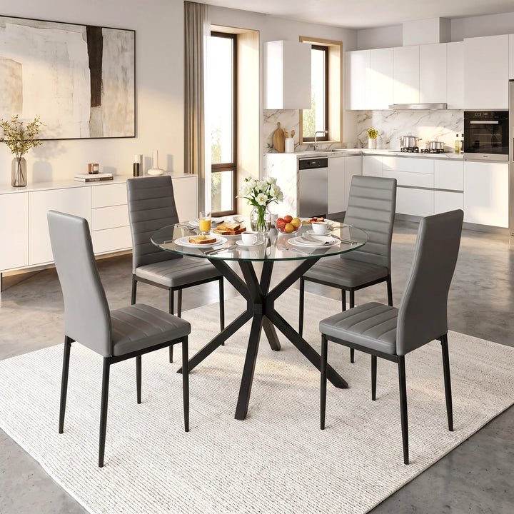 [Grey] Skyra Round Glass Dining Table and 4 Grey Chairs Set styled in a bright modern open-plan kitchen and dining area.