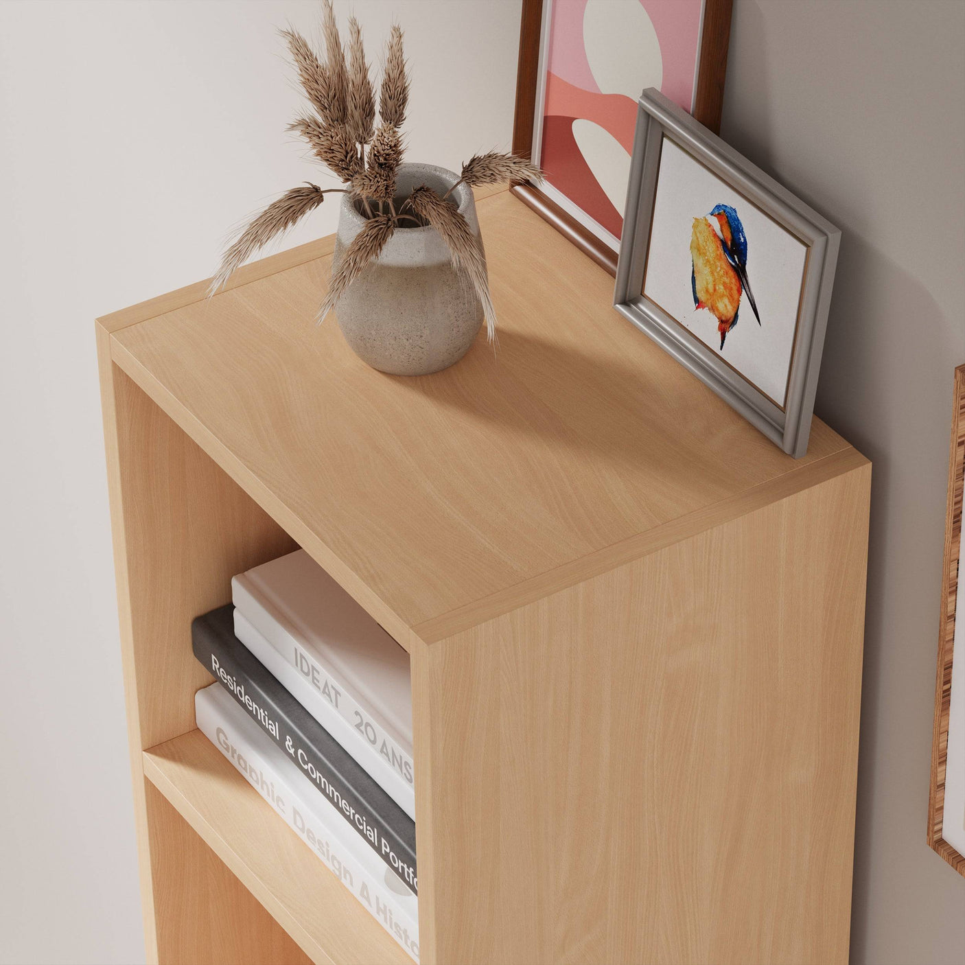 Top view of natural wood Blisswood bookcase with decor, ideal for minimalist or Scandinavian interiors.