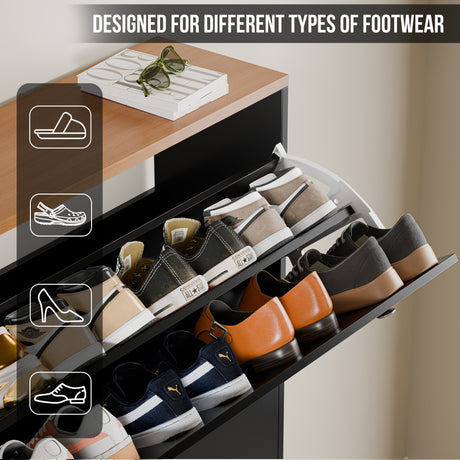 Close-up of black shoe storage cabinet drawers showing crocs, sneakers, slippers, boots and wellies stored inside neatly.