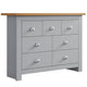Slim tall chest of drawers with handles, perfect for compact spaces while providing ample storage.