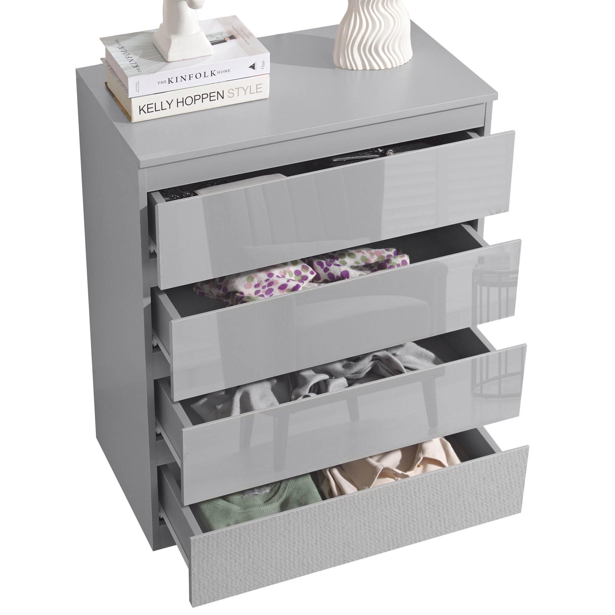 Small 4 drawer chest of drawers, offering compact storage with a sleek and modern design.