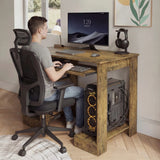 [Rustic] Rustic home office computer desk scene with mesh task chair pulled in, person typing at extended tray
