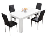 Small dining table with stylish wooden chairs, perfect for compact spaces.