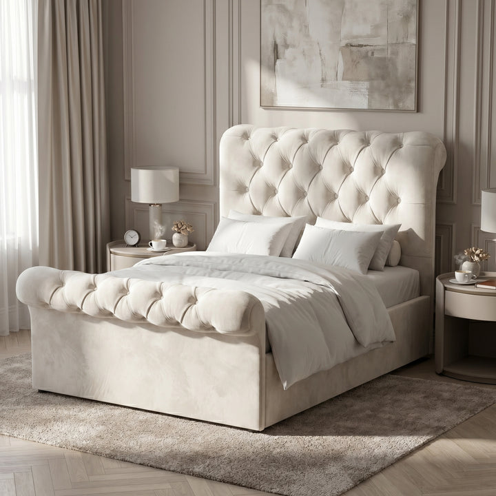 [Small Double | Beige] Side bedroom view with tall tufted headboard, rolled footboard, layered pillows, lamp, and curtains