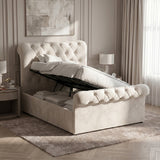 [Small Double | Beige] Ottoman storage view with raised slatted base, black lift frame, folded bedding, and panelled wall