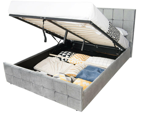 Small double ottoman storage bed with mattress, light grey color, space-saving design.