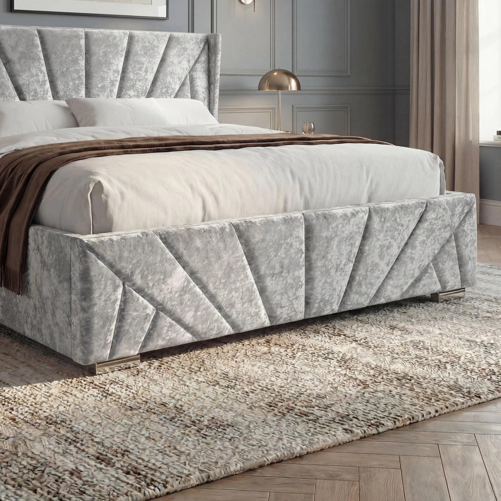 [Small Double | Silver] Footboard detail showing pleated velvet panels, white bedding, brown throw, and metal feet