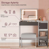 Makeup vanity with mirror, storage shelves, and stool in a bathroom setting.