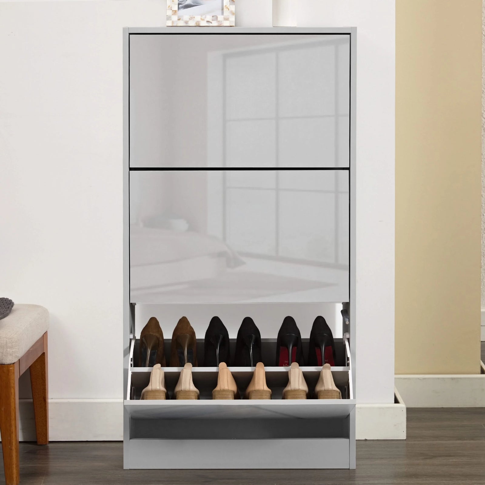 [Silver Grey] Front-facing thin shoe cabinet with the lowest drawer open, displaying multiple pairs of shoes.