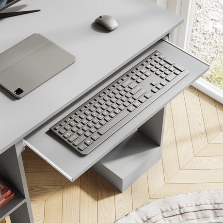 Home Office Computer Desk With Shelves For Working, Reading & Gaming featuring a slide-out keyboard tray and side storage shelves in a compact grey design.