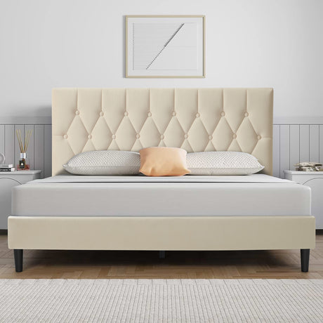 Soft frame bed uk with cream upholstered headboard, tufted button design, and black legs.