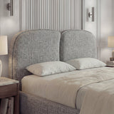Wooden grey double bed frame featuring a comfortable, soft headboard and neutral bedding in a modern bedroom setup