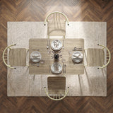 [Sonoma Oak] Torvi 4 seater dining set bird's-eye view fully laid with plates, cutlery, glasses and napkins on a textured rug over herringbone floor