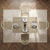 [Sonoma Oak] Torvi 4 seater dining set bird's-eye view fully laid with plates, cutlery, glasses and napkins on a textured rug over herringbone floor