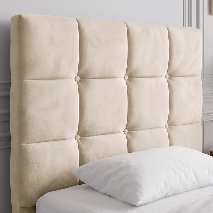 [Single | Beige] Close-up of beige velvet ottoman bed headboard with square button tufting and white pillow at the base