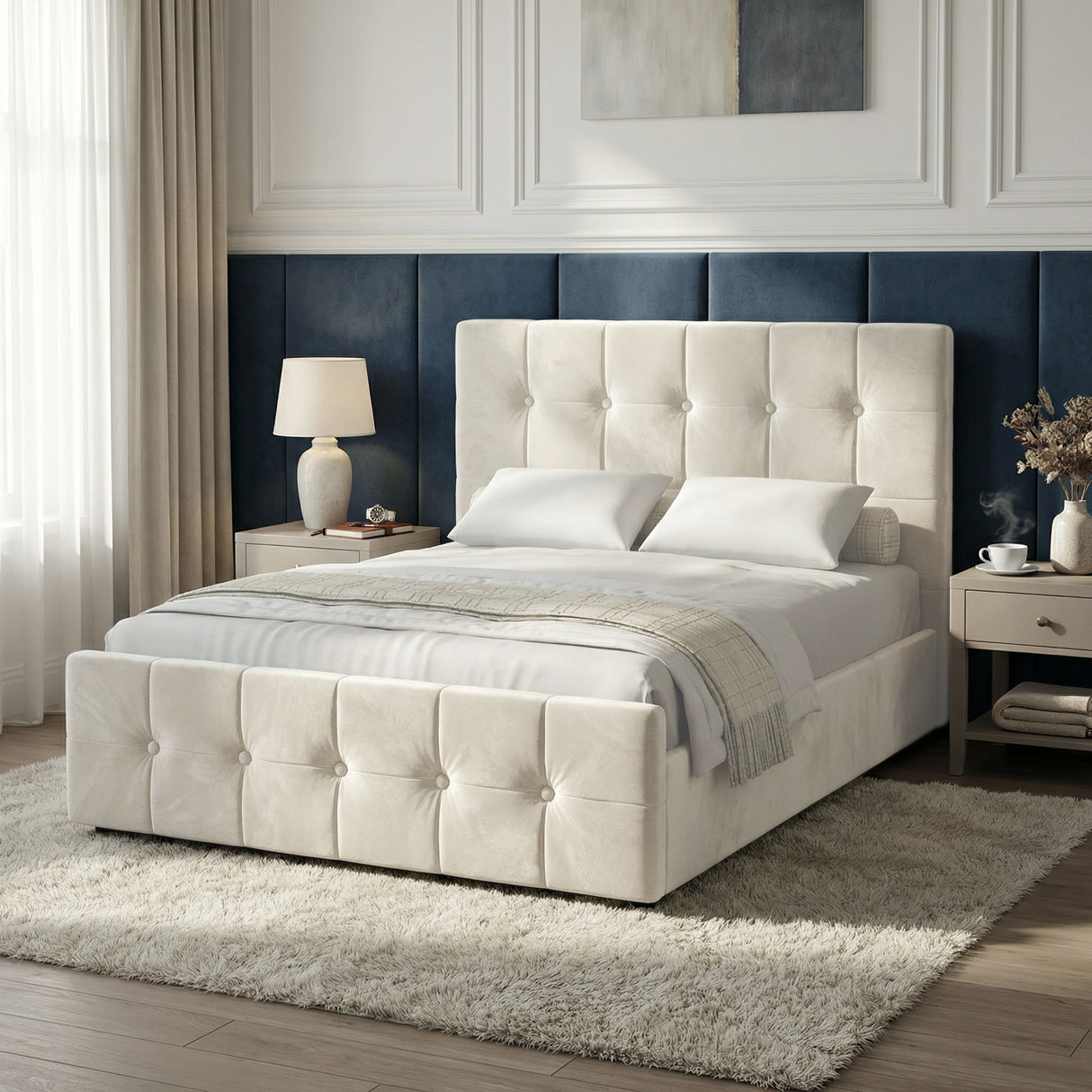 [Double | Beige] Button-tufted ottoman bed from the side with navy panelled accent wall and grey nightstands