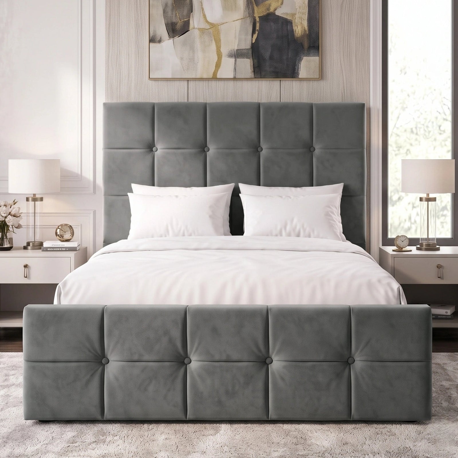 [Small Double | Dark Grey]  upholstered bed with a tufted headboard and matching footboard, styled in a bright, contemporary bedroom with white bedding, bedside tables, lamps, and a large abstract painting above.