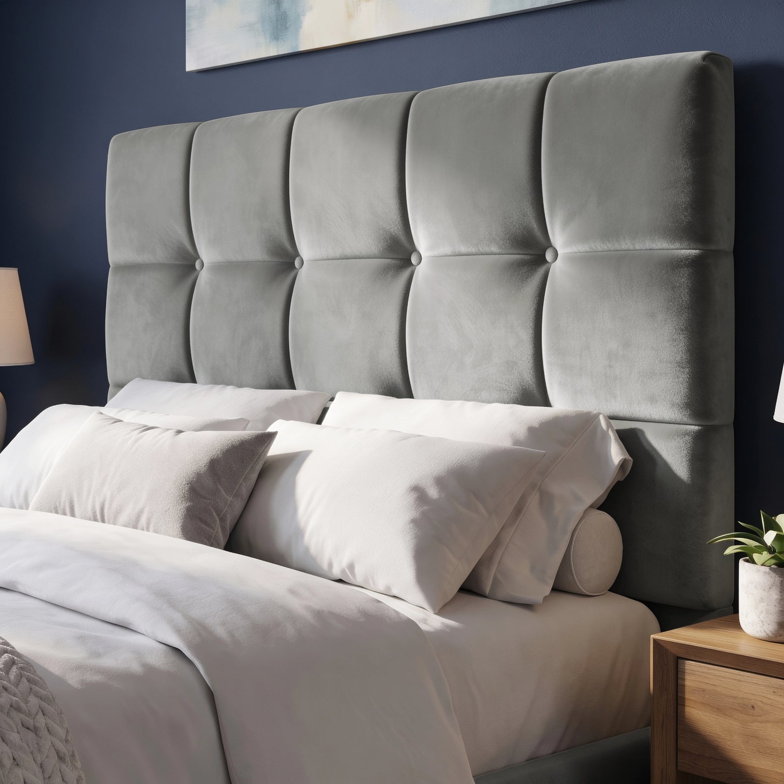 [Small Double | Grey] Close-up of square-tufted headboard with five covered buttons against taupe wall and white moulding