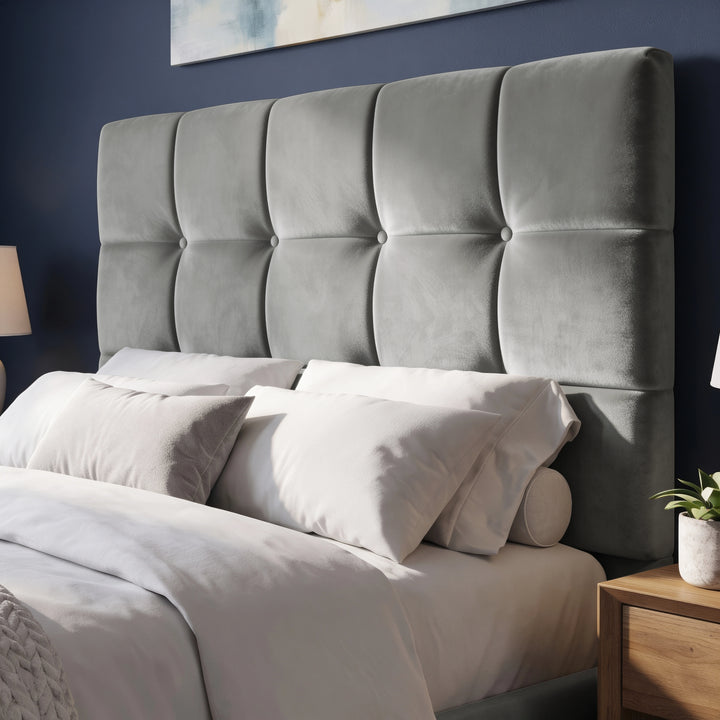 [Small Double | Grey] Close-up of square-tufted headboard with five covered buttons against taupe wall and white moulding